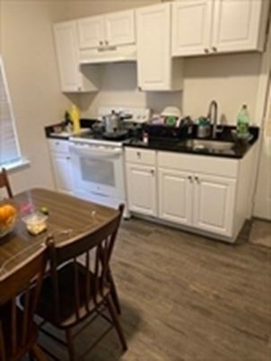 Interior, Kitchen, Tile Countertops, Wood Texture Flooring
