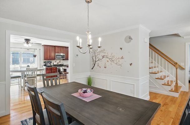 Chandelier, Dining room, Interior, Kitchen, Pendant Lights, Stainless Steel Appliances, Wood Texture Flooring