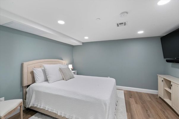 Bedroom, Fitness Equipment, Interior, Recessed Lighting, Wood Texture Flooring
