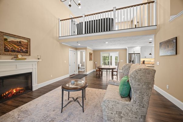 Dining room, Fireplace, Interior, Kitchen, Recessed Lighting, Wood Texture Flooring