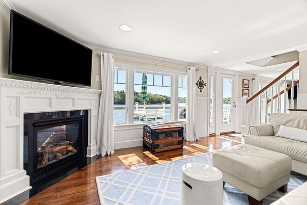 Fireplace, Interior, Living room, Recessed Lighting, Water, Wood Texture Flooring