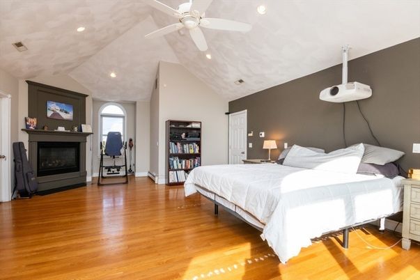 Bedroom, Fireplace, Interior, Recessed Lighting, Wood Texture Flooring