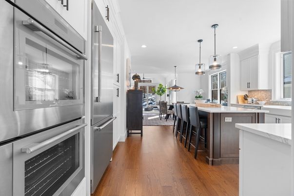 Dining room, Interior, Kitchen, Pendant Lights, Recessed Lighting, Stainless Steel Appliances, Wood Texture Flooring