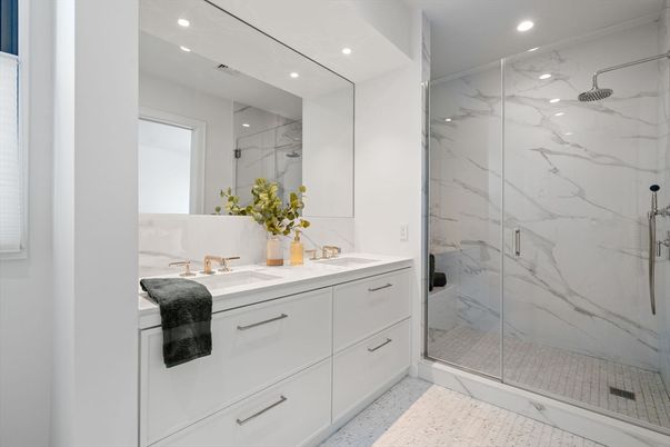 Bathroom, Dual Sink Vanities, Glass Shower, Interior, Marble Walls, Recessed Lighting