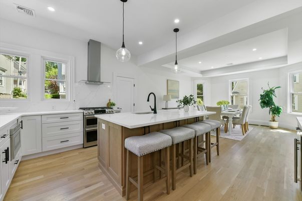 Dining room, Interior, Kitchen, Marble Walls, Pendant Lights, Recessed Lighting, Stainless Steel Appliances, Wood Texture Flooring