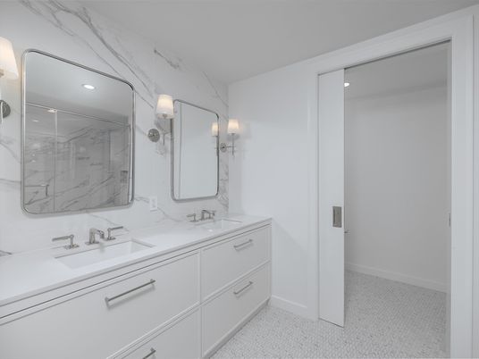 Bathroom, Dual Sink Vanities, Interior, Marble Walls, Recessed Lighting