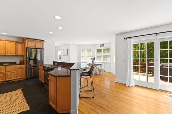 Dining room, Interior, Kitchen, Recessed Lighting, Stainless Steel Appliances, Wood Texture Flooring