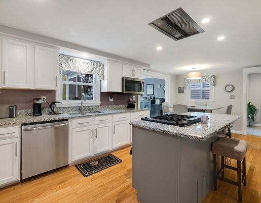 Dining room, Interior, Kitchen, Recessed Lighting, Stainless Steel Appliances, Wood Texture Flooring