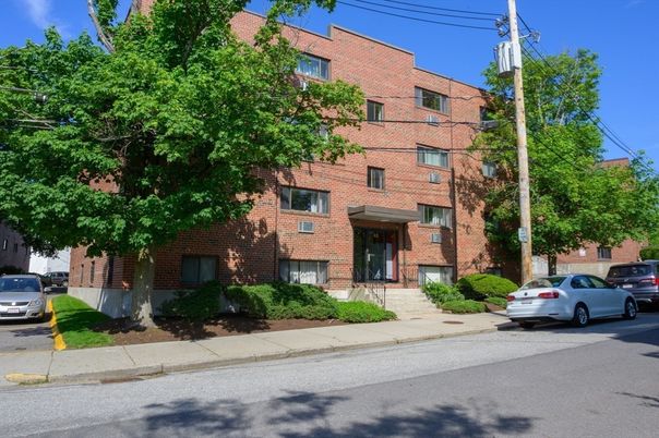 Exterior, Facade, Brick Facade, Condo Building