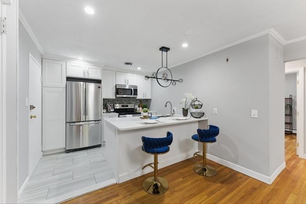 Interior, Kitchen, Pendant Lights, Recessed Lighting, Stainless Steel Appliances, Wood Texture Flooring
