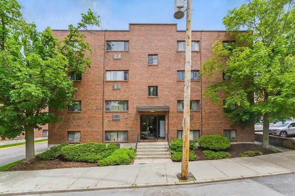 Exterior, Facade, Brick Facade, Condo Building