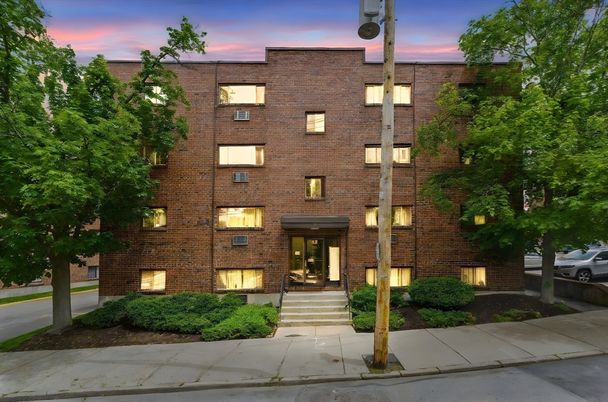 Exterior, Facade, Brick Facade, Condo Building