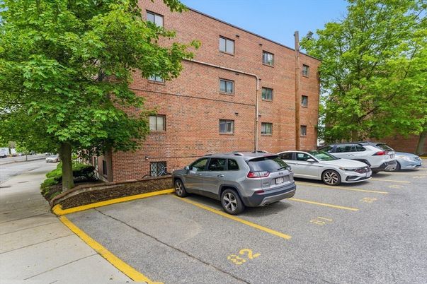 Exterior, Facade, Brick Facade, Condo Building