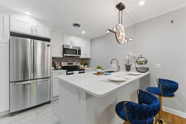 Interior, Kitchen, Pendant Lights, Recessed Lighting, Stainless Steel Appliances, Wood Texture Flooring