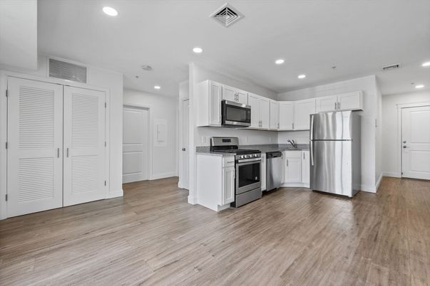 Interior, Kitchen, Recessed Lighting, Stainless Steel Appliances, Wood Texture Flooring