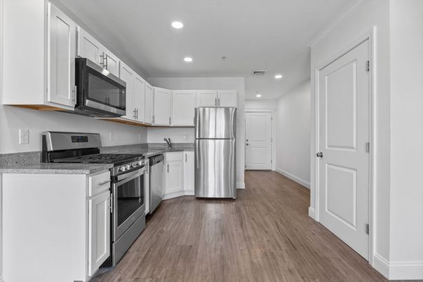 Interior, Kitchen, Recessed Lighting, Stainless Steel Appliances, Wood Texture Flooring