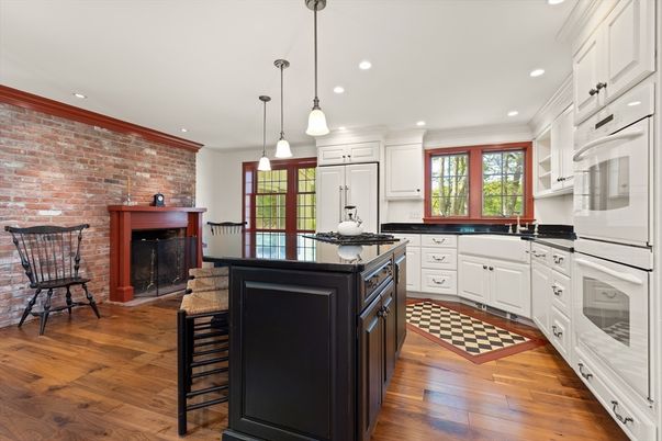 Fireplace, Interior, Kitchen, Pendant Lights, Recessed Lighting, Stone Walls, Wood Texture Flooring