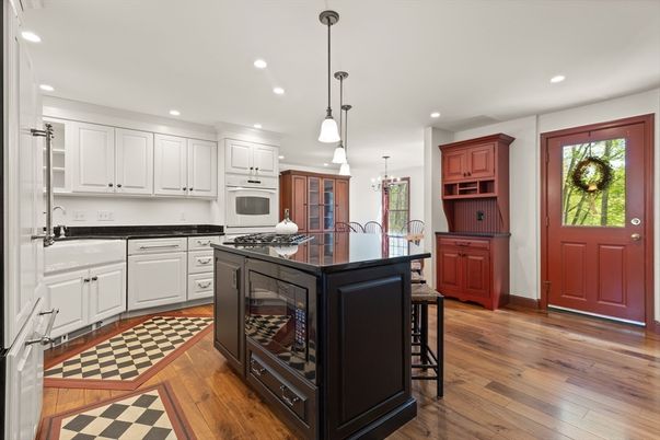 Chandelier, Interior, Kitchen, Pendant Lights, Recessed Lighting, Stainless Steel Appliances, Wood Texture Flooring