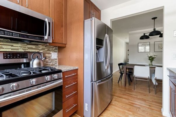 Dining room, Interior, Kitchen, Pendant Lights, Stainless Steel Appliances, Wood Texture Flooring
