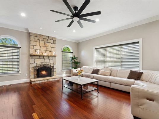 Fireplace, Interior, Living room, Recessed Lighting, Stone Walls, Wood Texture Flooring
