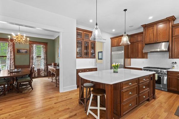 Chandelier, Dining room, Interior, Kitchen, Pendant Lights, Recessed Lighting, Stainless Steel Appliances, Wood Texture Flooring