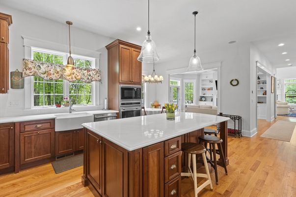 Chandelier, Interior, Kitchen, Pendant Lights, Recessed Lighting, Stainless Steel Appliances, Wood Texture Flooring