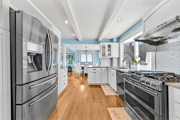 Dining room, Interior, Kitchen, Pendant Lights, Recessed Lighting, Stainless Steel Appliances, Wood Texture Flooring