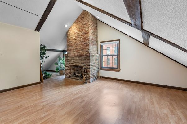 Empty room, Fireplace, Interior, Stone Walls, Wooden Beams, Wood Texture Flooring