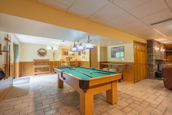 Billiard Table, Fireplace, Game Room, Interior, Pendant Lights, Stone Walls