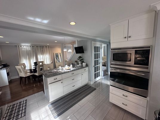 Dining room, Interior, Kitchen, Recessed Lighting, Stainless Steel Appliances, Wood Texture Flooring