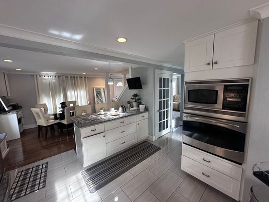 Dining room, Interior, Kitchen, Recessed Lighting, Stainless Steel Appliances, Wood Texture Flooring
