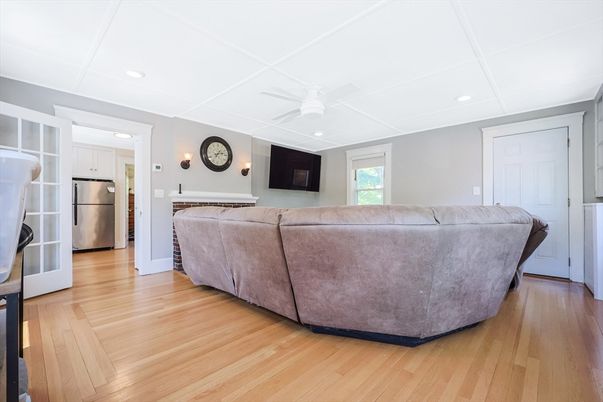 Fireplace, Interior, Kitchen, Living room, Recessed Lighting, Stainless Steel Appliances, Wood Texture Flooring