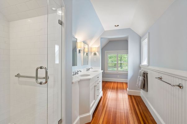 Bathroom, Dual Sink Vanities, Glass Shower, Interior, Recessed Lighting, Wood Texture Flooring