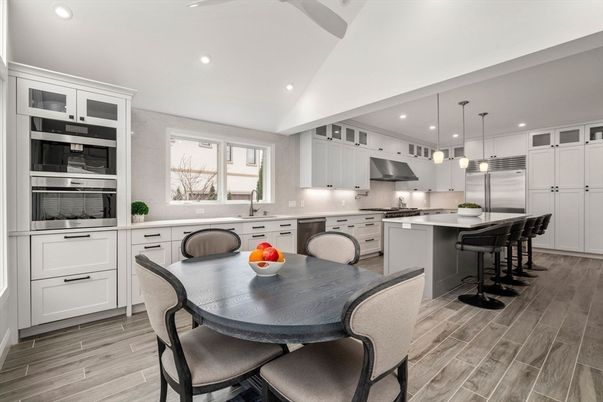 Dining room, Interior, Kitchen, Pendant Lights, Recessed Lighting, Stainless Steel Appliances, Wood Texture Flooring