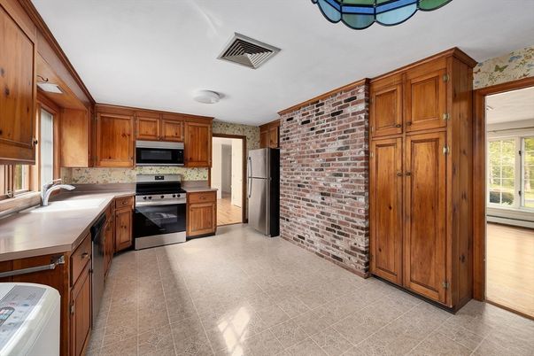 Interior, Kitchen, Stainless Steel Appliances, Stone Walls, Wood Texture Flooring