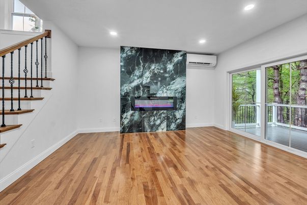 Empty room, Fireplace, Interior, Marble Walls, Recessed Lighting, Wood Texture Flooring