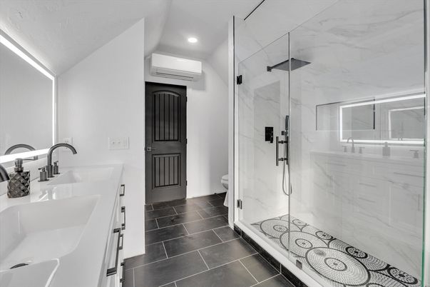 Bathroom, Dual Sink Vanities, Glass Shower, Interior, Marble Walls, Recessed Lighting