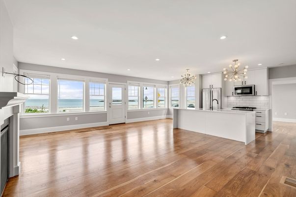 Fireplace, Interior, Kitchen, Pendant Lights, Recessed Lighting, Stainless Steel Appliances, Water, Wood Texture Flooring