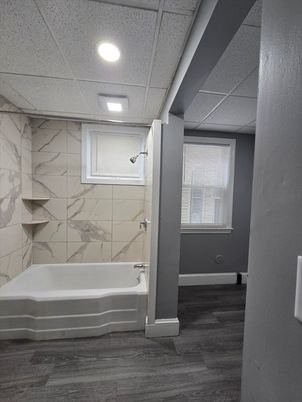 Bathroom, Interior, Marble Walls, Recessed Lighting, Wood Texture Flooring