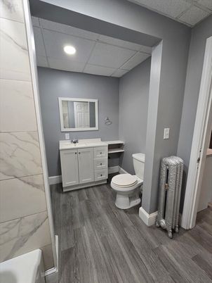 Bathroom, Interior, Marble Walls, Recessed Lighting, Wood Texture Flooring