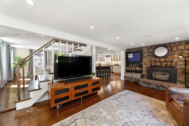 Fireplace, Interior, Kitchen, Living room, Recessed Lighting, Stone Walls, Wood Texture Flooring