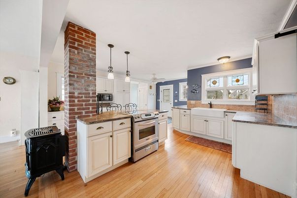 Interior, Kitchen, Pendant Lights, Stainless Steel Appliances, Stone Walls, Wood Texture Flooring