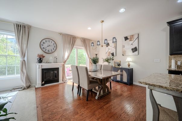 Dining room, Fireplace, Interior, Pendant Lights, Recessed Lighting, Wood Texture Flooring