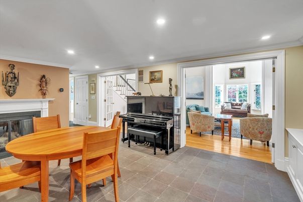 Dining room, Fireplace, Interior, Living room, Piano, Recessed Lighting, Wood Texture Flooring