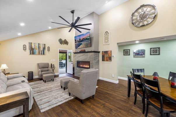 Dining room, Fireplace, Interior, Living room, Recessed Lighting, Wood Texture Flooring