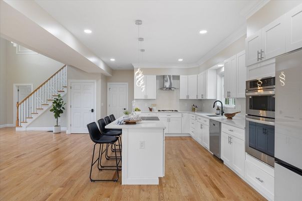 Interior, Kitchen, Pendant Lights, Recessed Lighting, Stainless Steel Appliances, Wood Texture Flooring