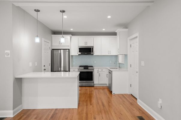 Interior, Kitchen, Pendant Lights, Recessed Lighting, Stainless Steel Appliances, Wood Texture Flooring