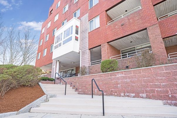 Exterior, Facade, Brick Facade, Condo Building