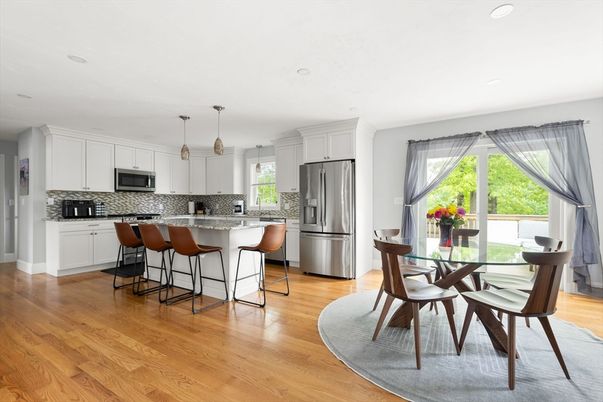 Dining room, Interior, Kitchen, Pendant Lights, Recessed Lighting, Stainless Steel Appliances, Wood Texture Flooring