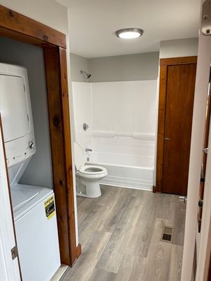 Bathroom, Interior, Recessed Lighting, Utility Closets, Washer, Wood Texture Flooring